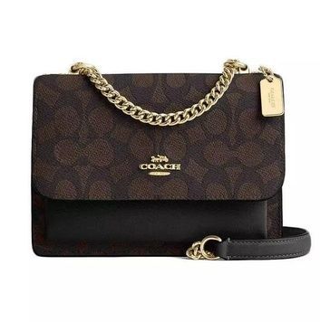 Женская сумка Coach Mini Klare Crossbody Bag In Signature Canvas темно-коричневая 196395556229 фото