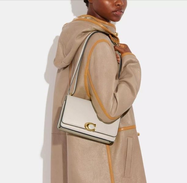 Сумка шкіряна Coach Bandit Shoulder Bag Brass/Ivory 195031911453 фото