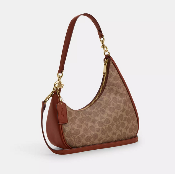Женская сумка Coach Twisted Teri Shoulder Bag In Signature Canvas Signature Canvas/IM/Tan/Caramel CBI02-Gold фото